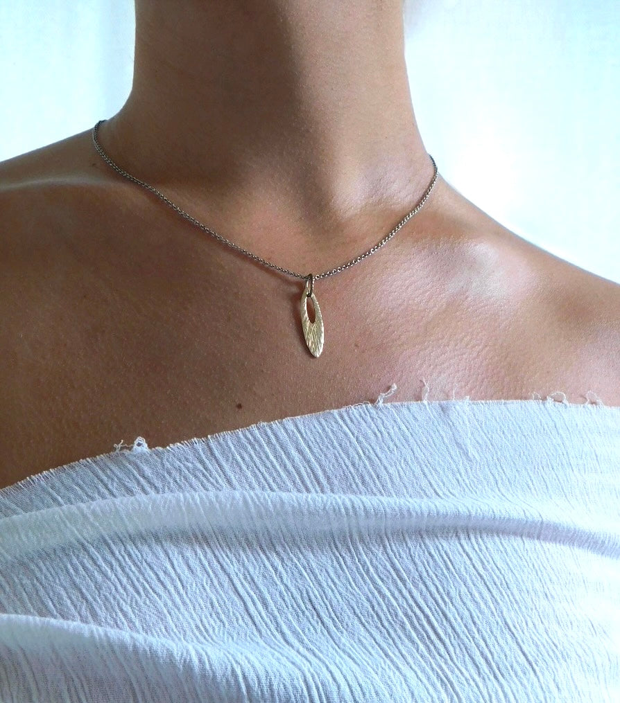 Gold Textured Petal Pendent With Silver Chain